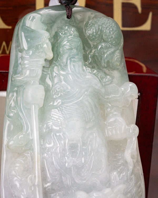 White/Green Guan Gong Lurking Dragon Two-Toned Jade Pendant