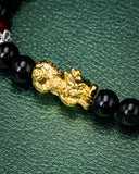 Small Gold Dragon Black Bead Jade Bracelet