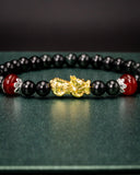 Small Gold Dragon Black Bead Jade Bracelet
