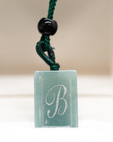 Micro Letter Engraved Jade Pendant