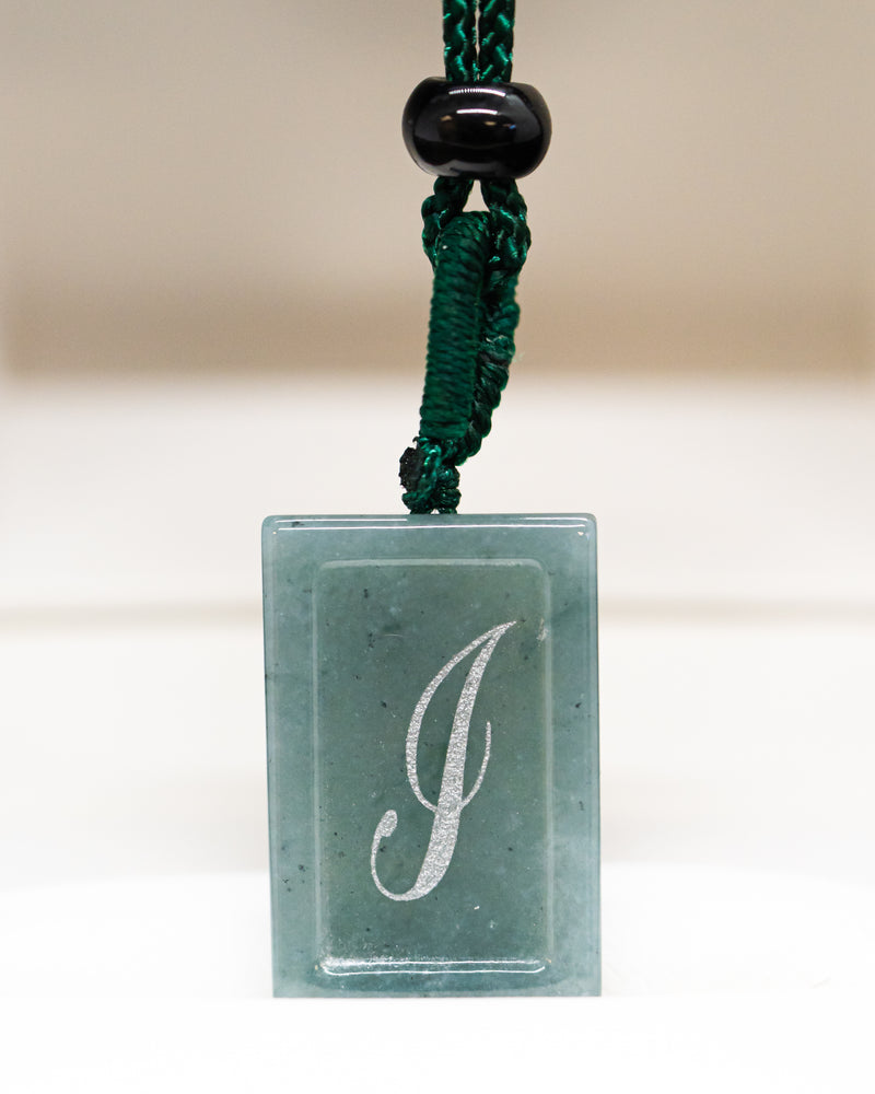 Micro Letter Engraved Jade Pendant